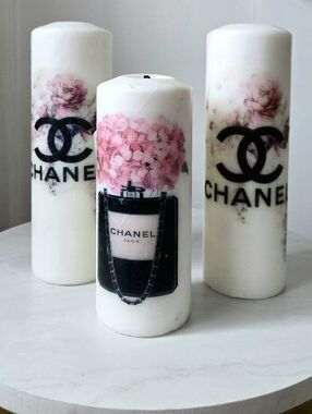 White Pillar Candles with Pink Floral Motif and Black Logo